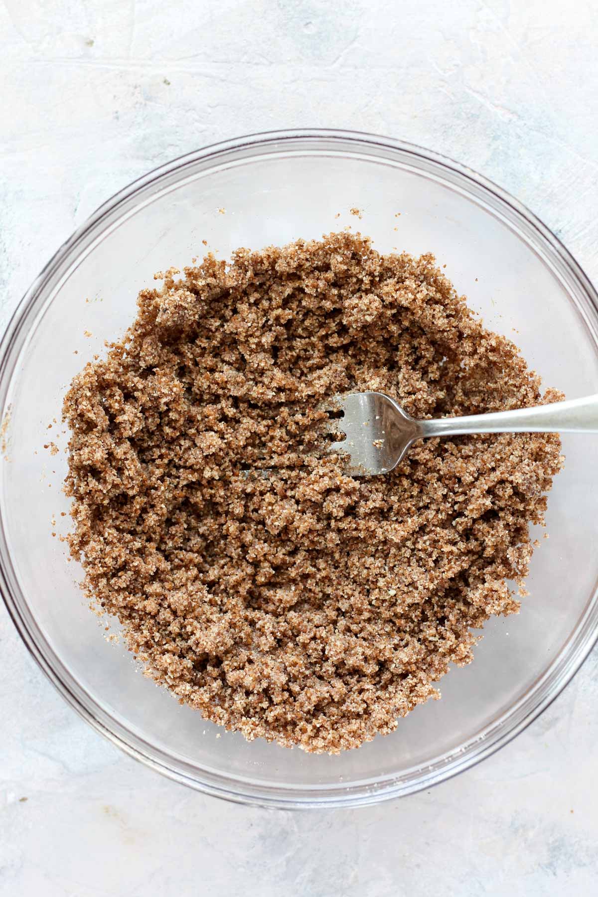 Bowl of cinnamon sugar crumble topping.