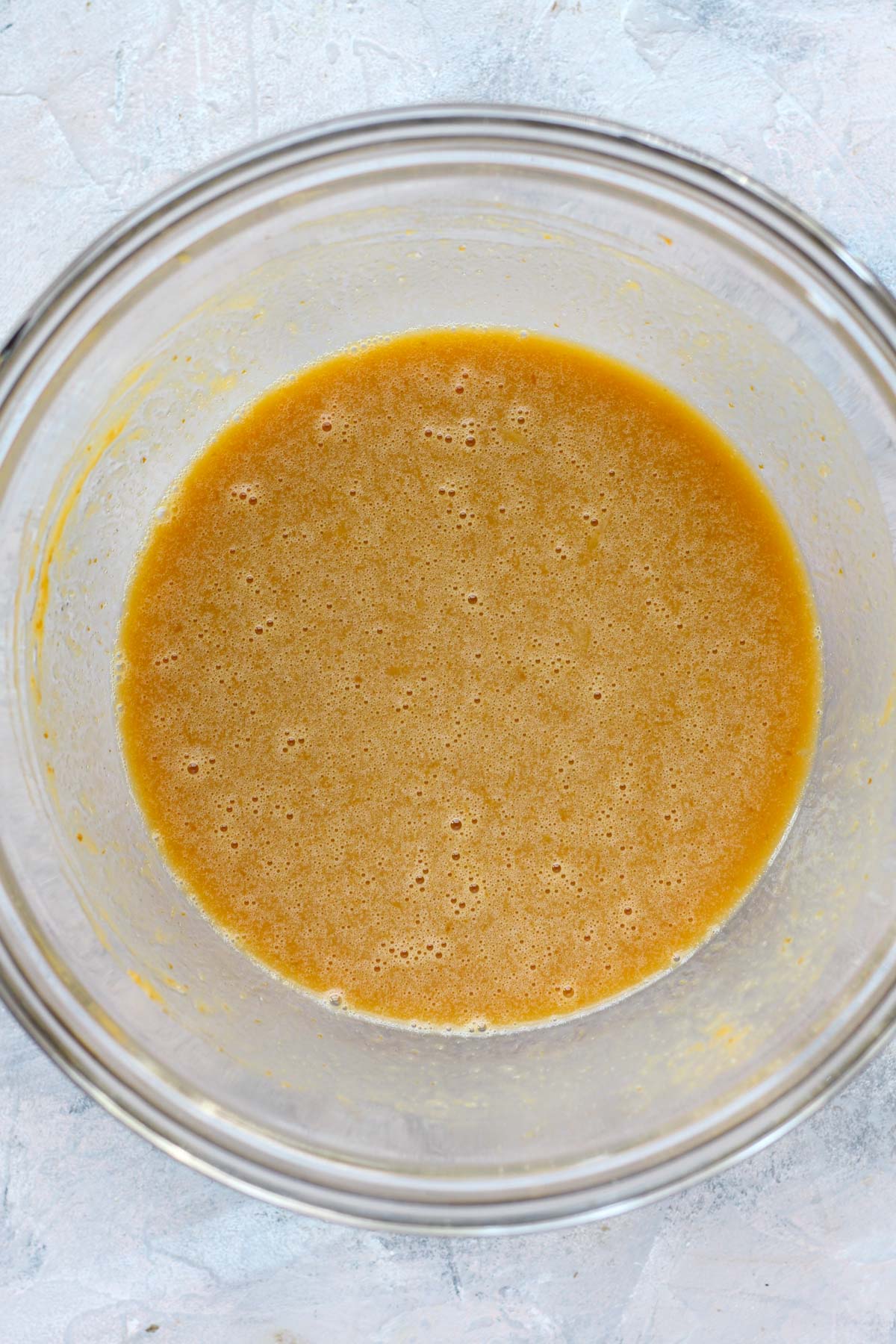 Wet ingredients in a mixing bowl.