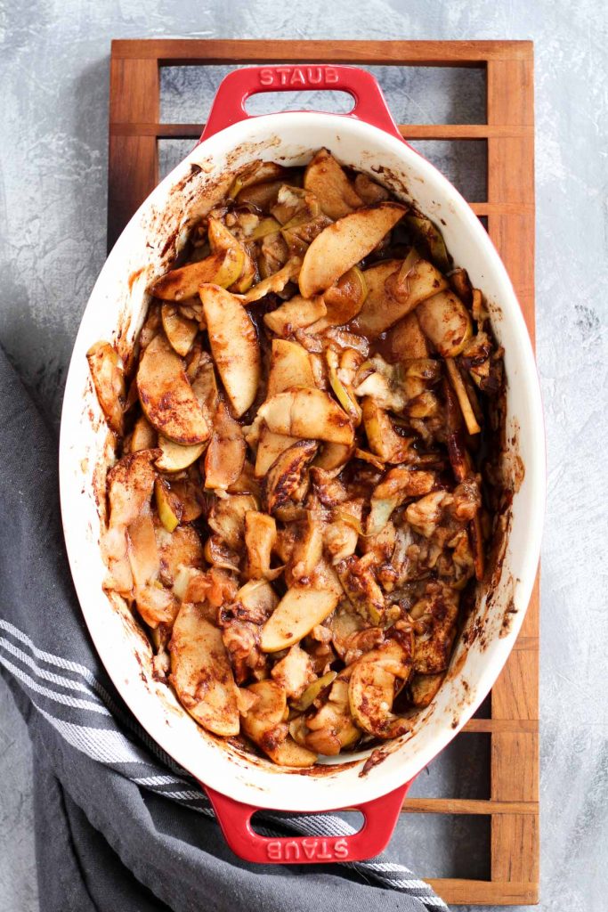 Baked apples in casserole dish.
