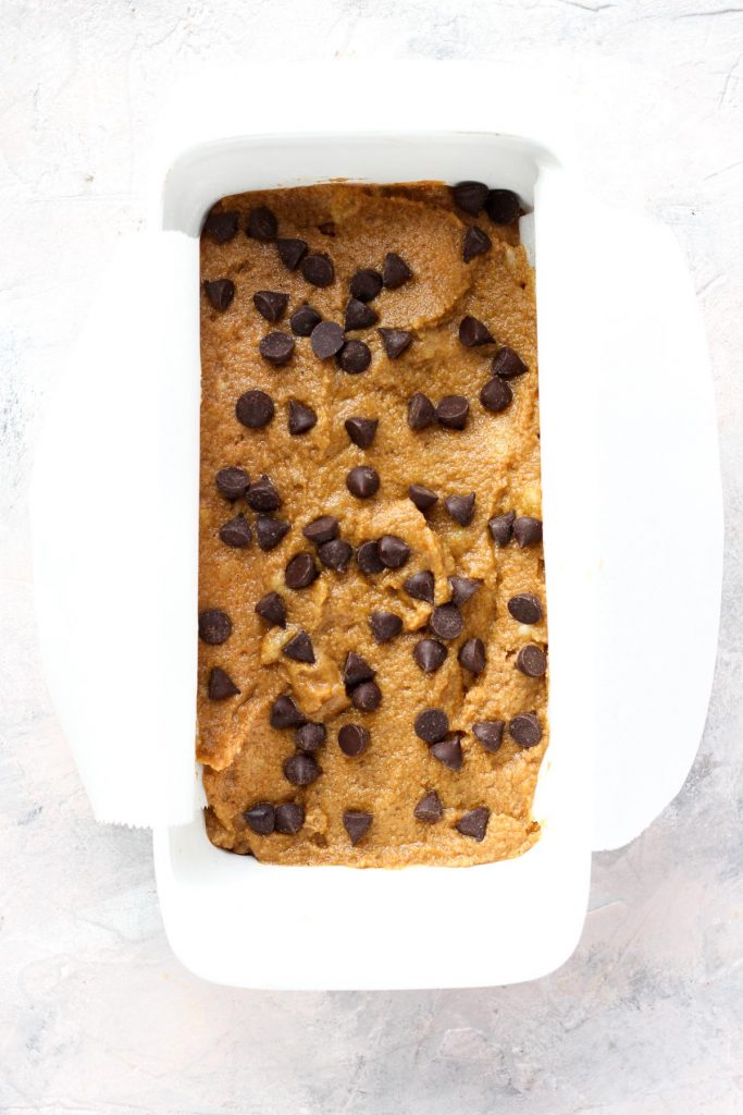 Overhead shot of pumpkin banana bread in bread pan before going into the oven.