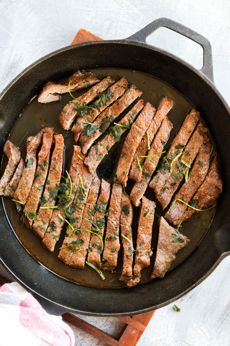 Close up picture of sliced steak.