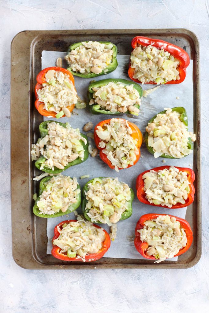 Peppers stuffed and ready to be baked.