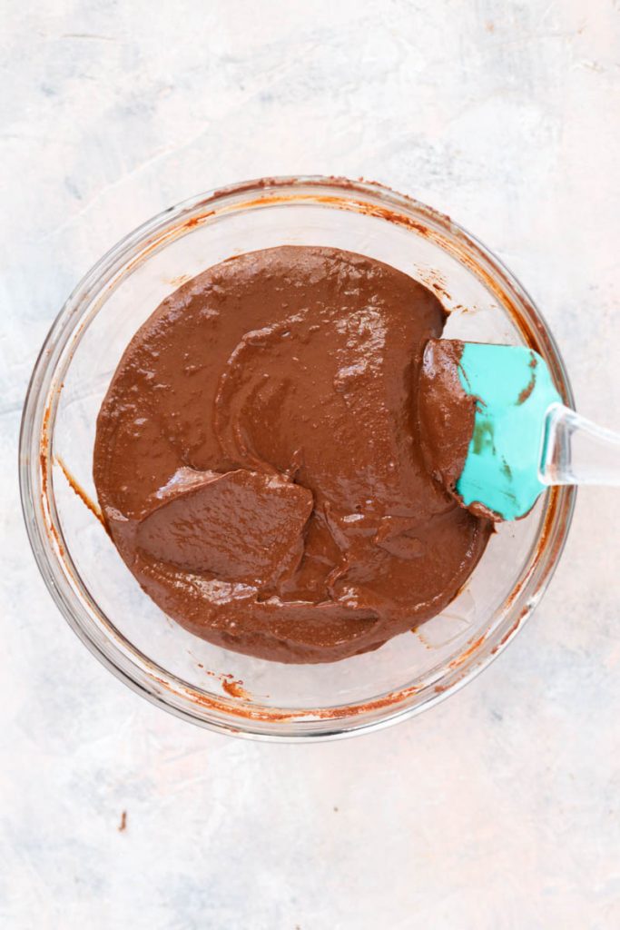 Truffle mixture folded with coconut flour.