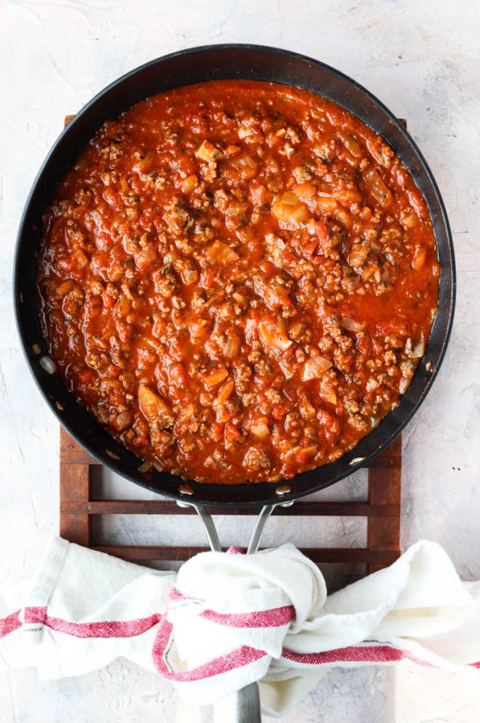 Cooked meat sauce in pan.