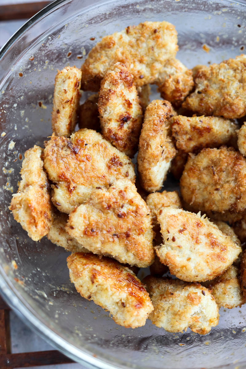 Crispy chicken in a mixing bowl.