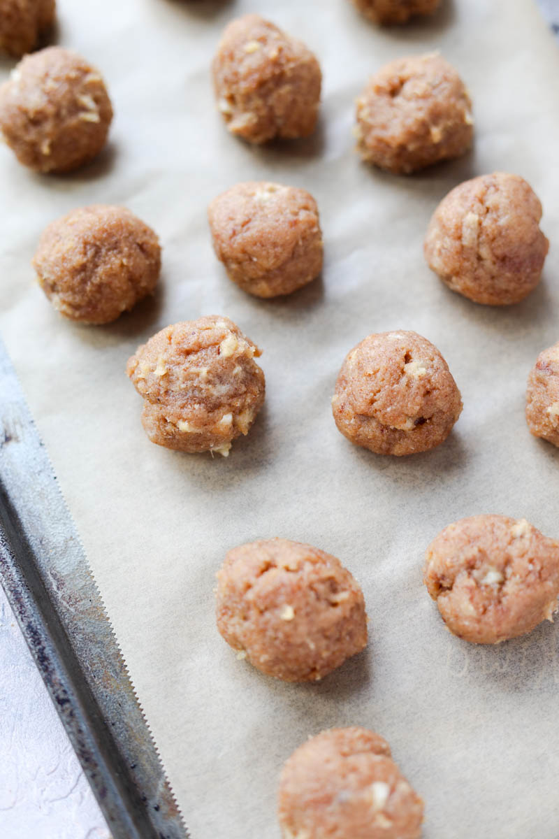 Banana bread dough rolled into balls.