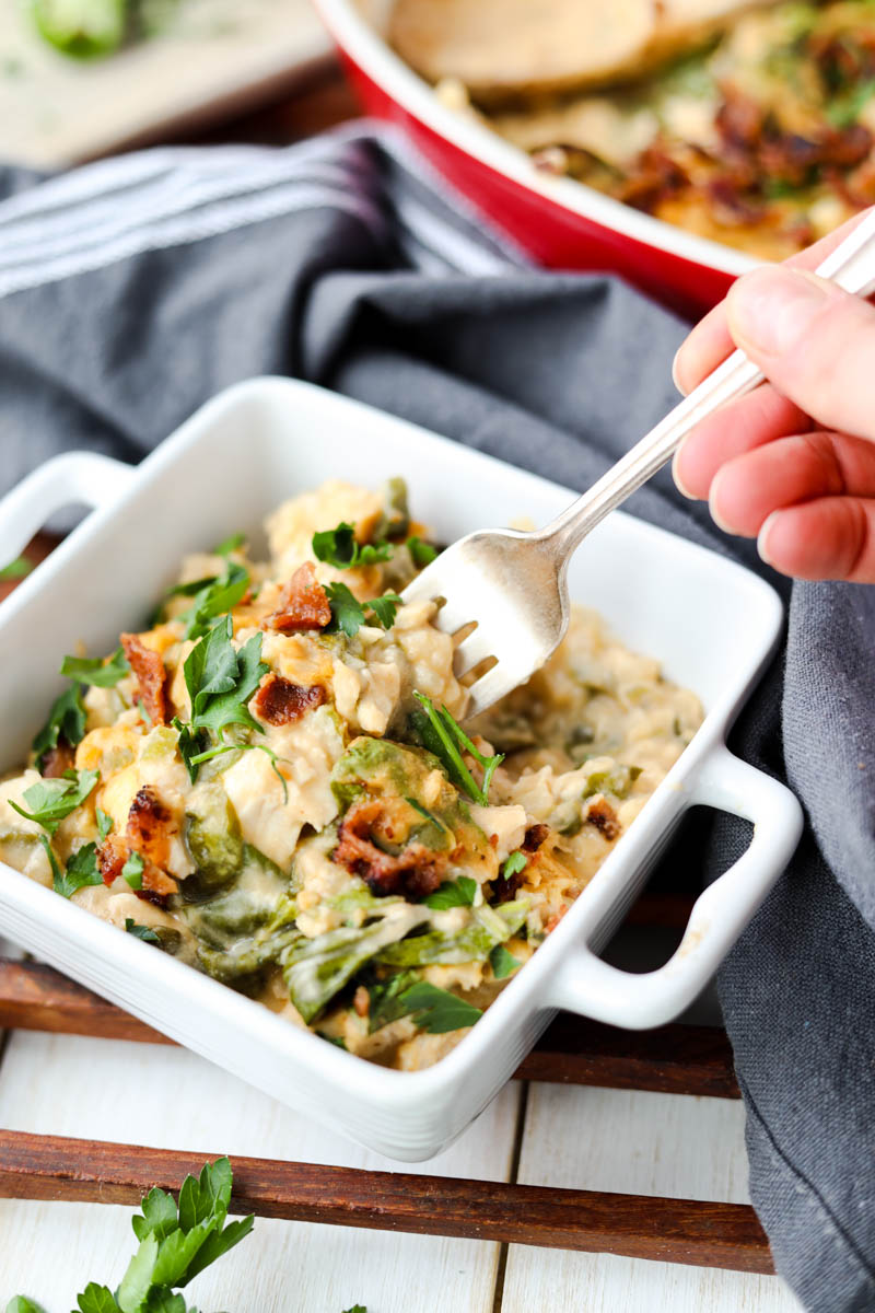 Fork scooping out casserole.