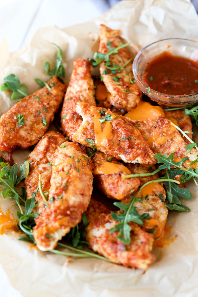 Basket filled with bbq chicken tenders.