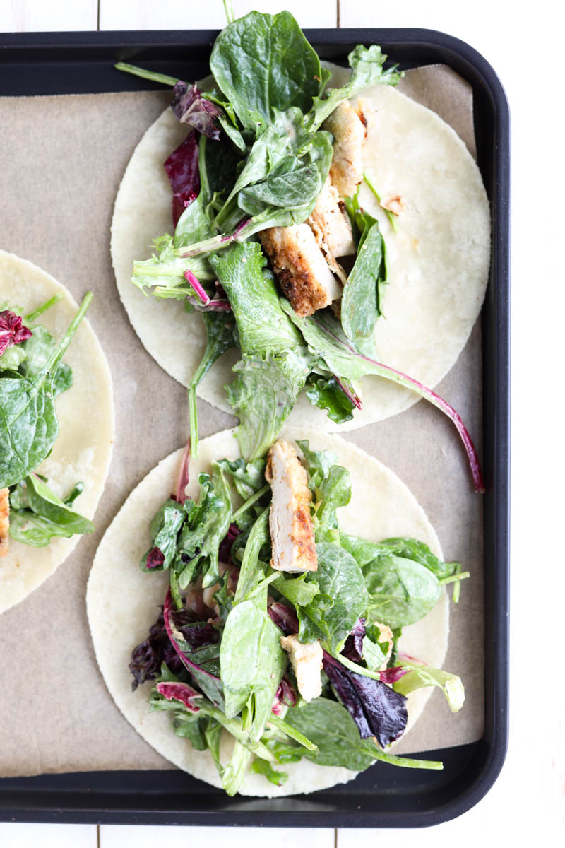 Lettuce and chicken in wraps.