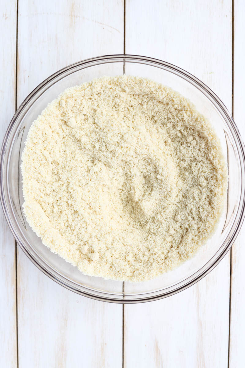 Dry ingredients in glass mixing bowl.