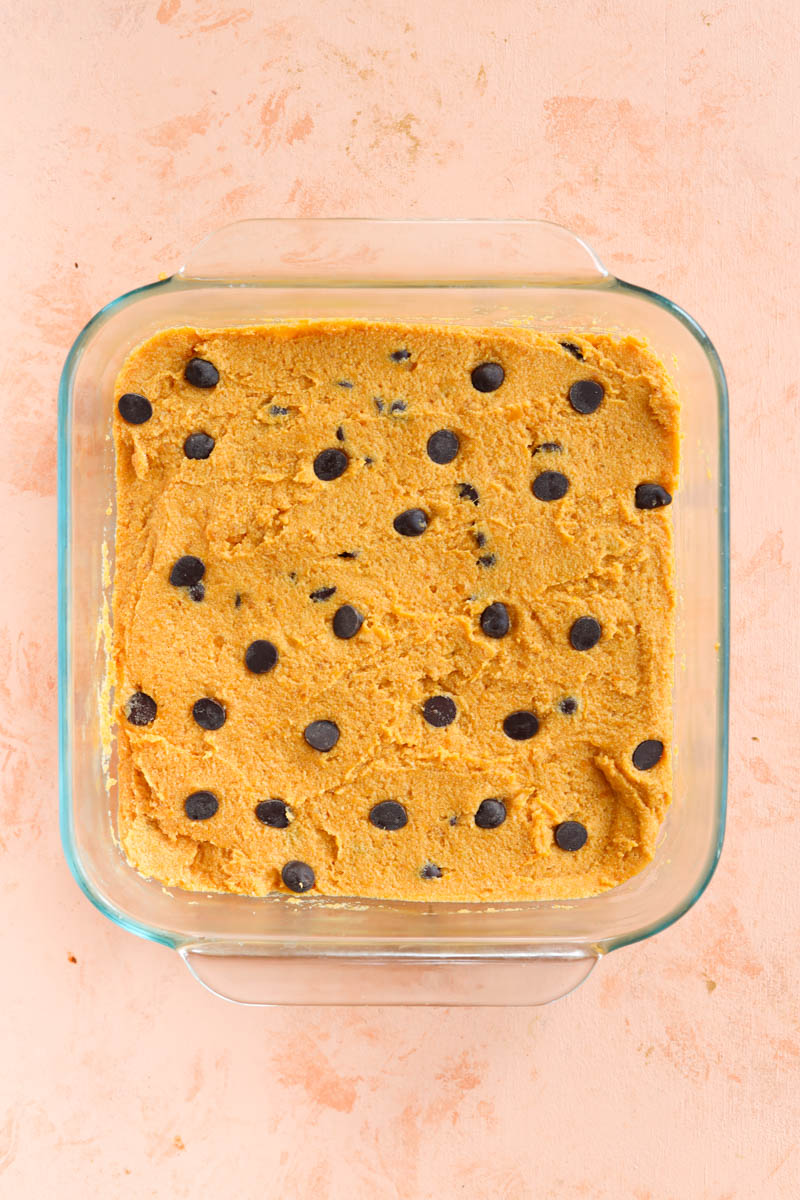 Blondies in square glass baking dish.