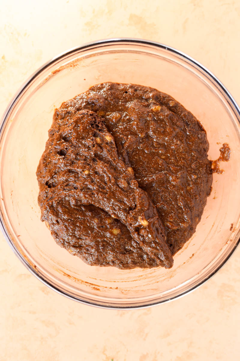 Muffin batter in glass mixing bowl.