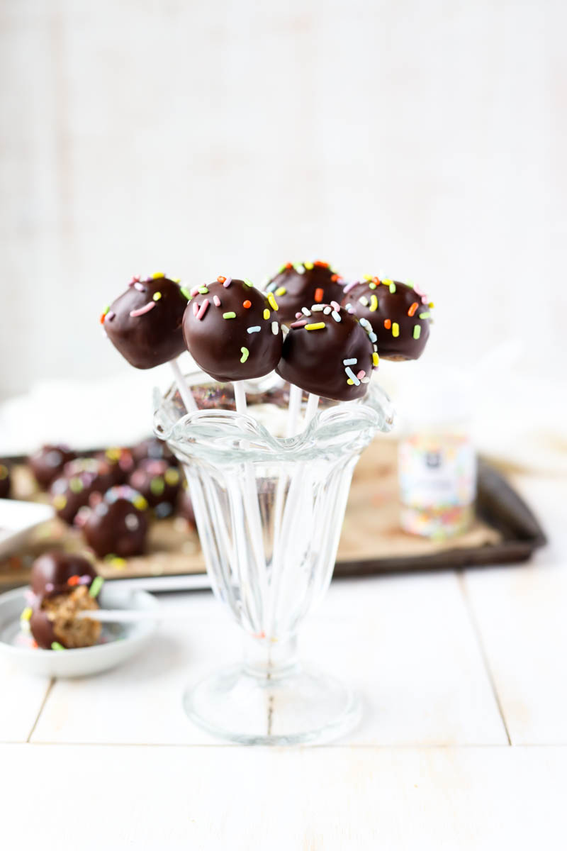 Cake pops in a glass jar.