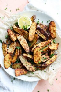 Overhead shot of fingerling potatoes on a plate.