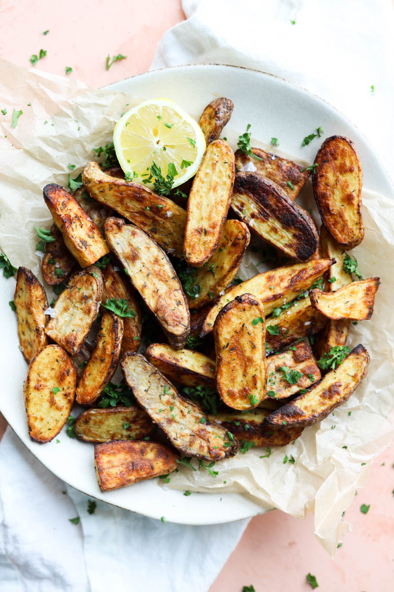 Overhead shot of fingerling potatoes on a plate.