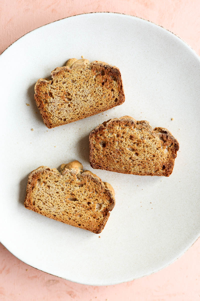 Golden brown toast on a white plate.