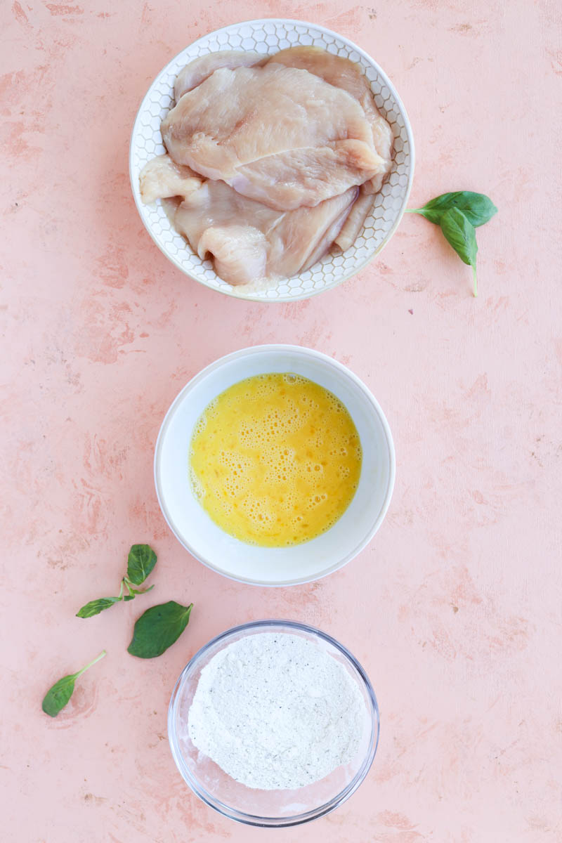 Prepped ingredients in small bowls.