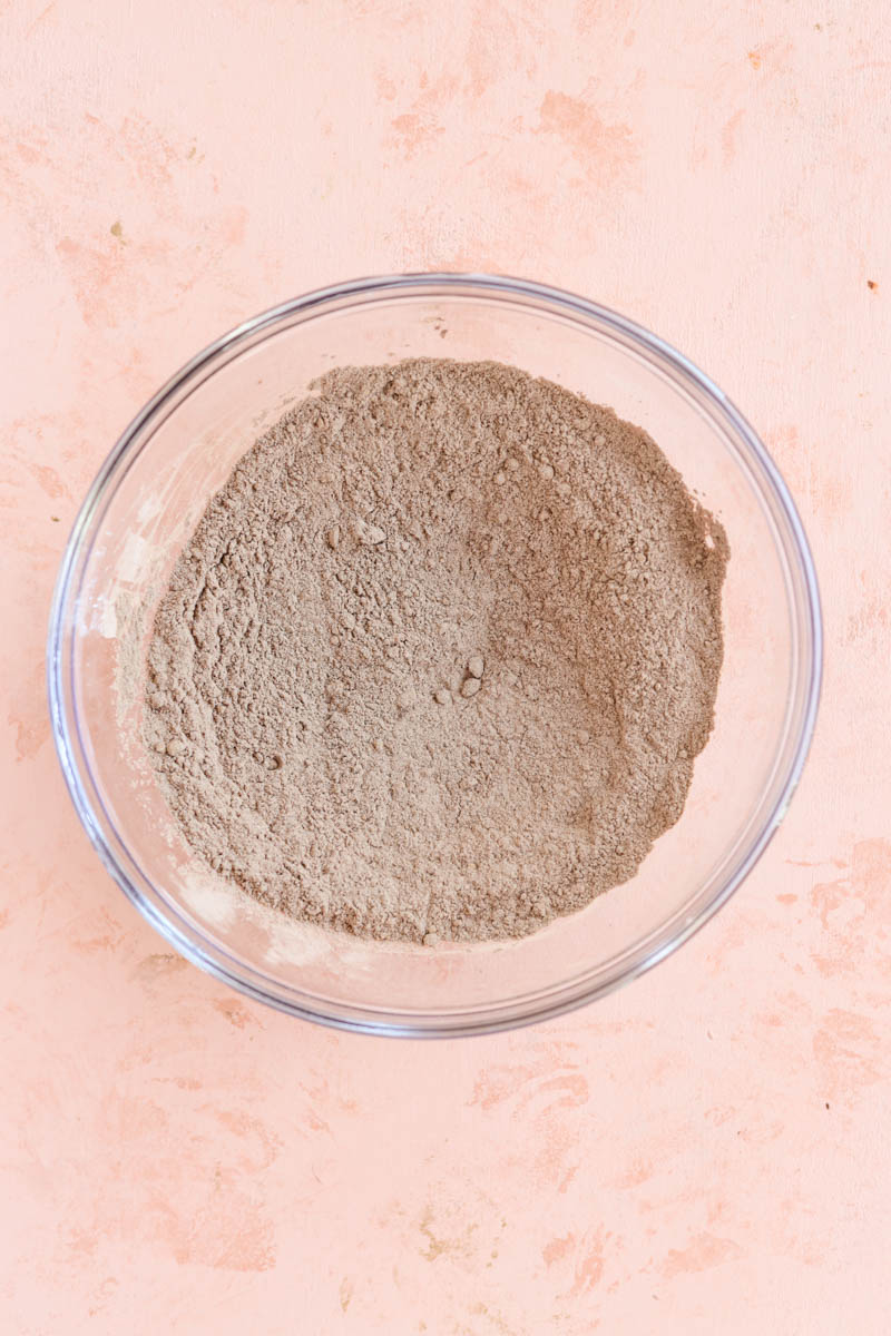 Dry ingredients in clear glass bowl.