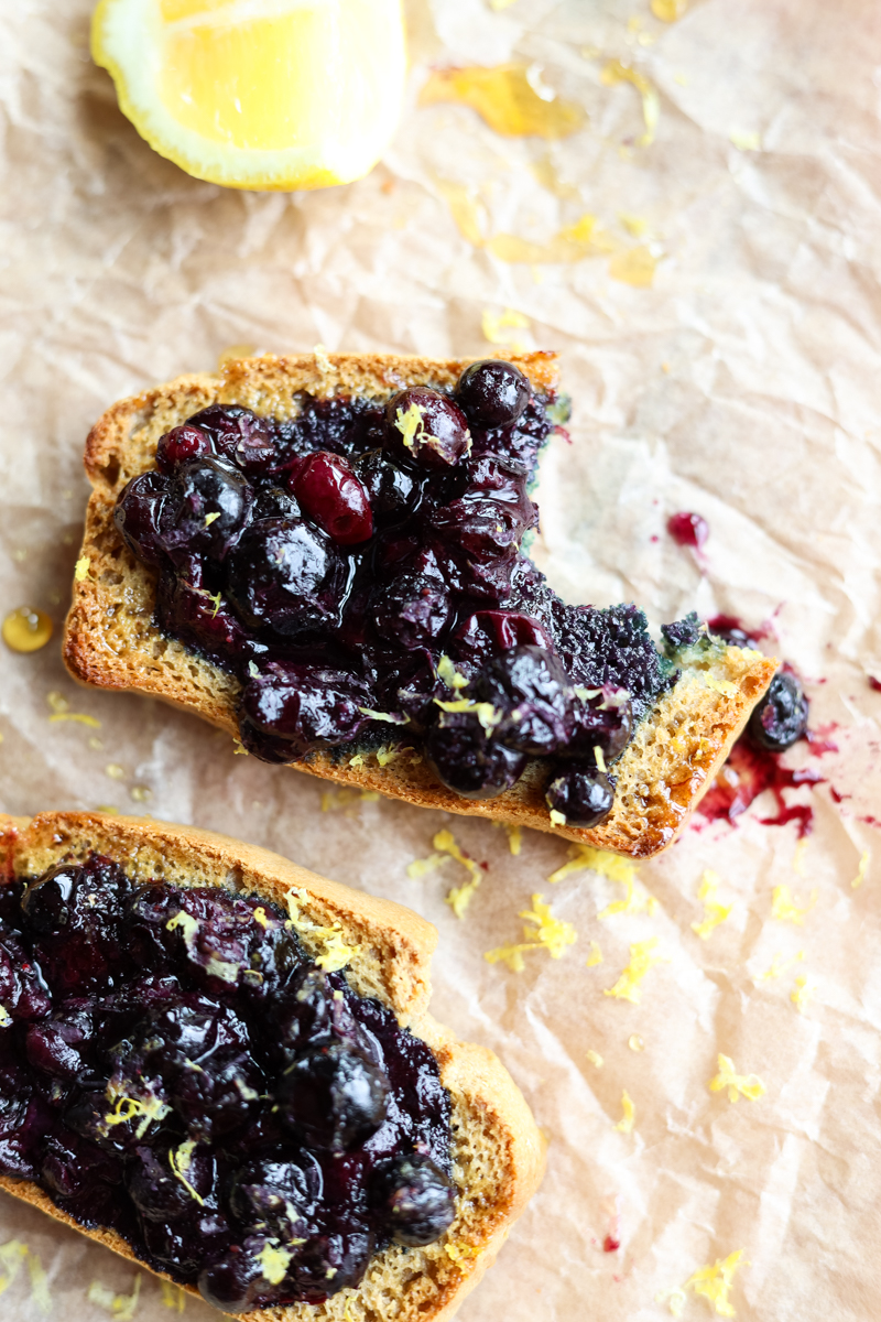 Close up picture of blueberry toast with a bite taken out.