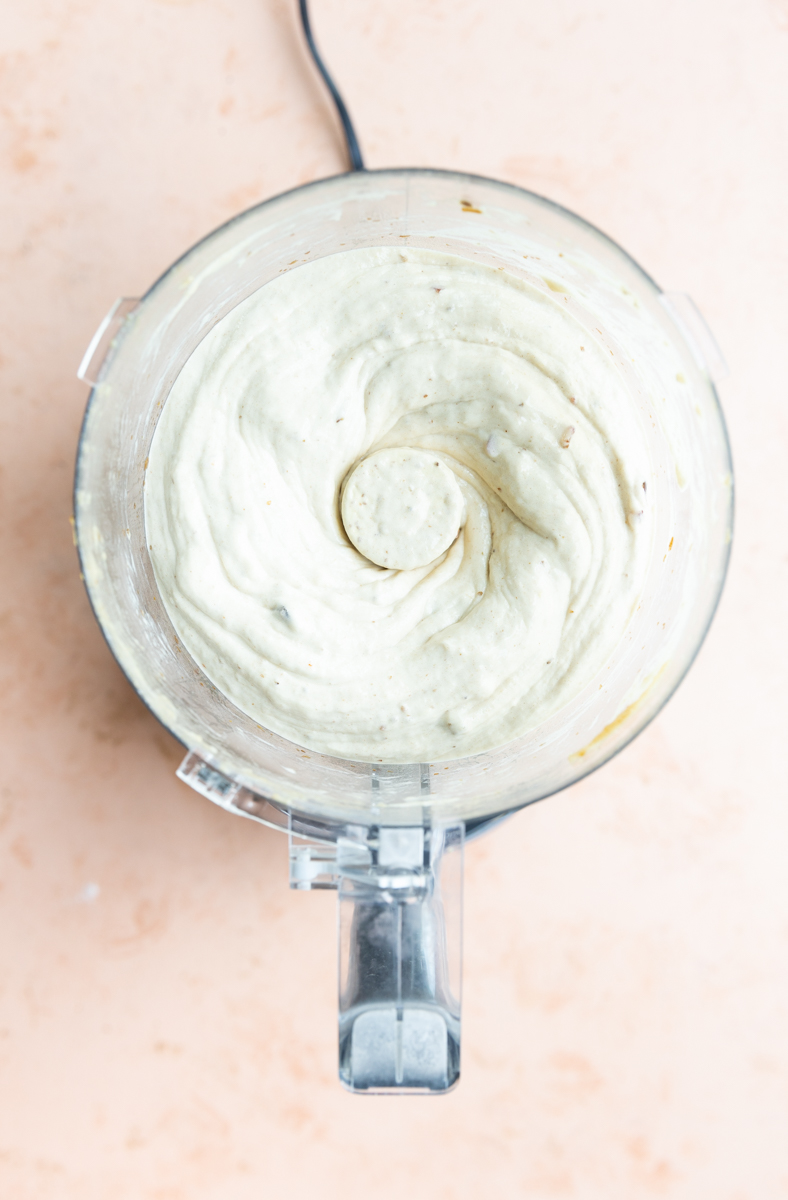 Creamy nice cream in food processor.