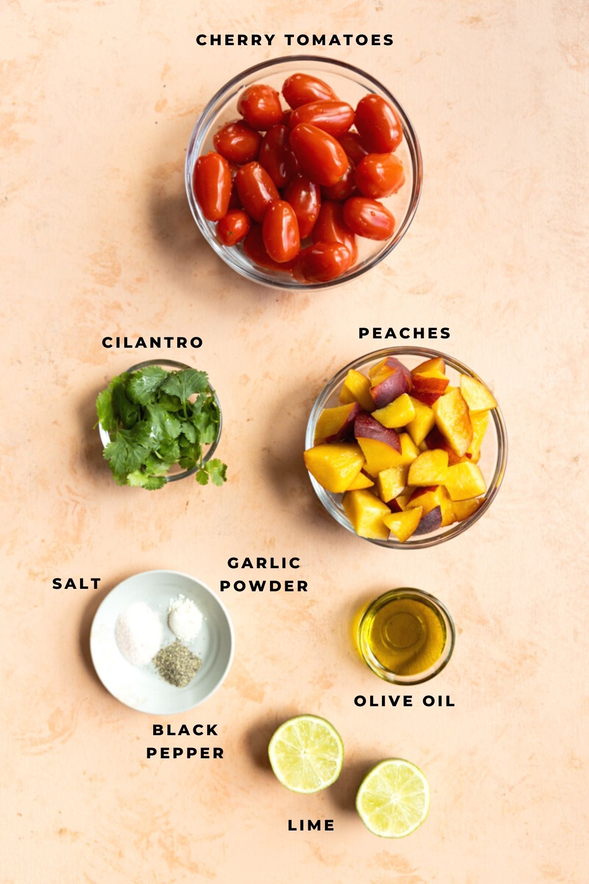 Peaches, cherry tomatoes, cilantro, olive oil, lime, salt, pepper, and garlic powder.