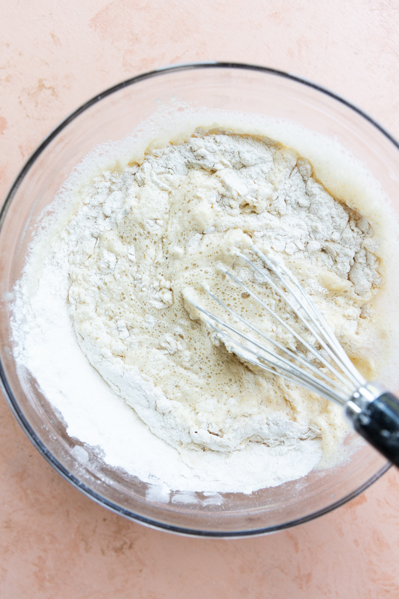 Whisk mixing waffle batter.