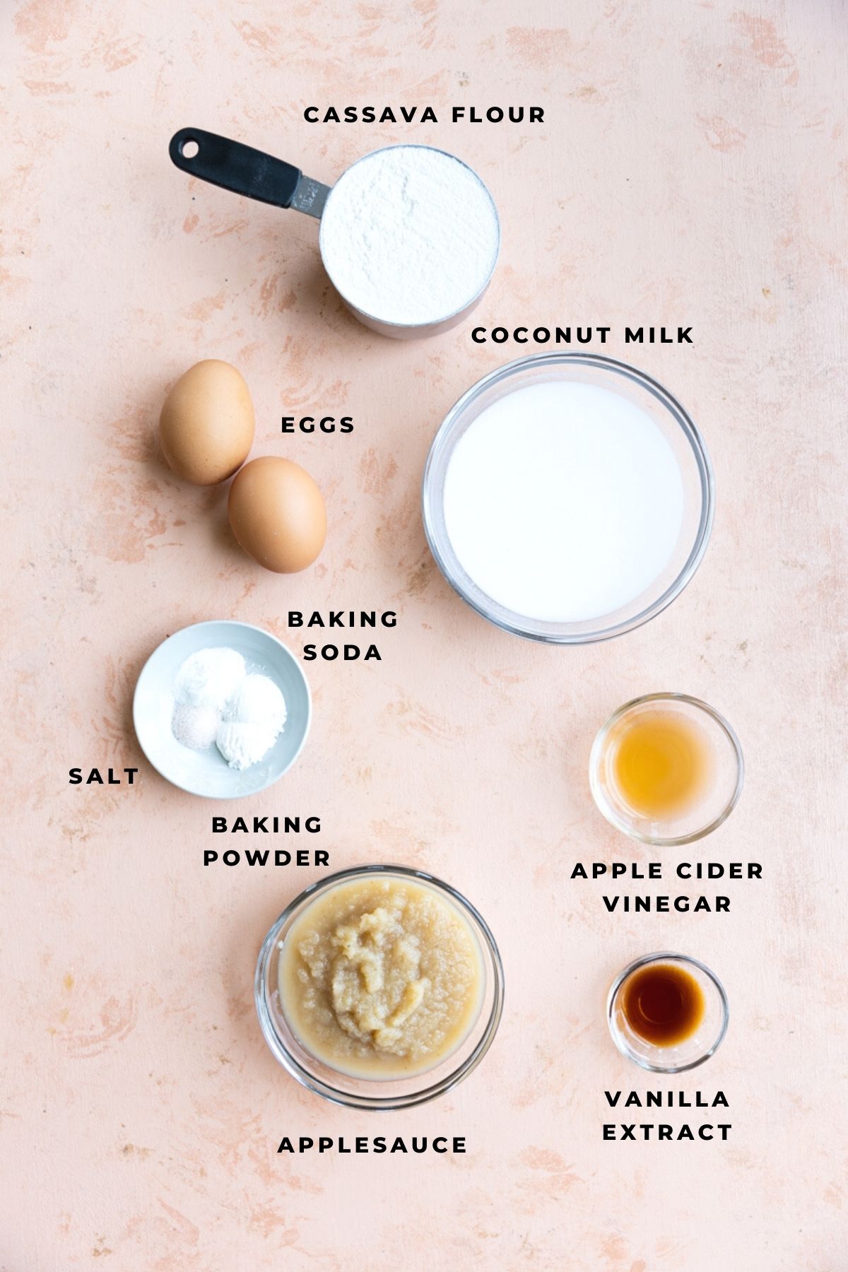 Ingredients for mini waffles measured out into small glass cups.