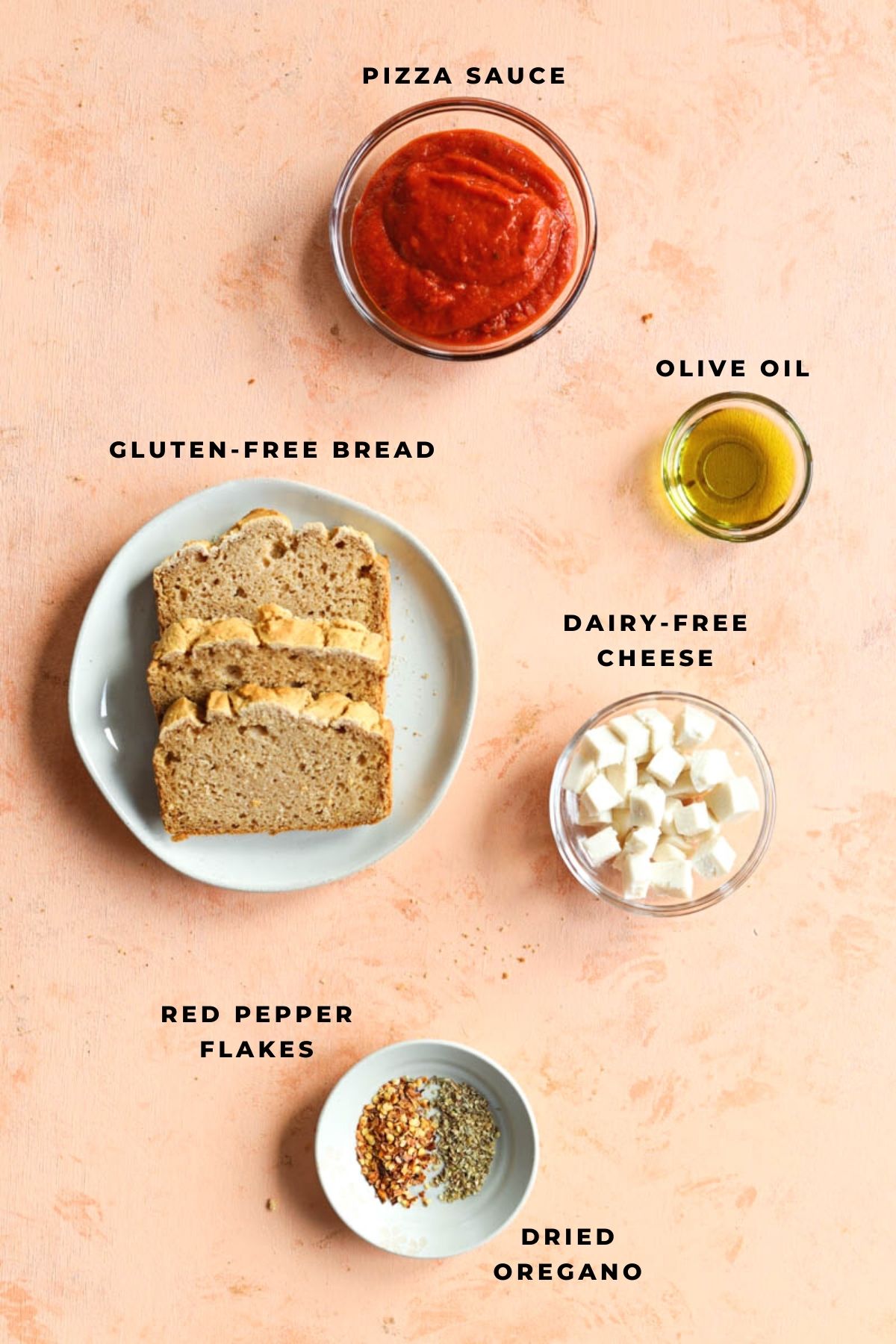 Pizza toast ingredients measured out into small cups.
