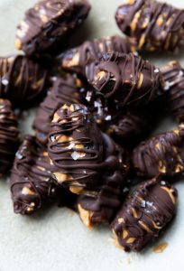 Close up picture of date snickers on a plate.