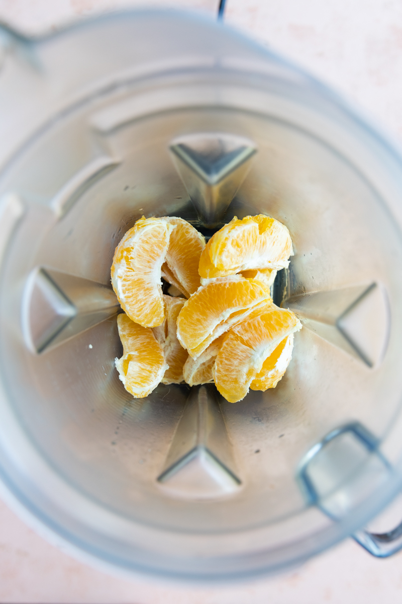 Peeled oranges in a blender.