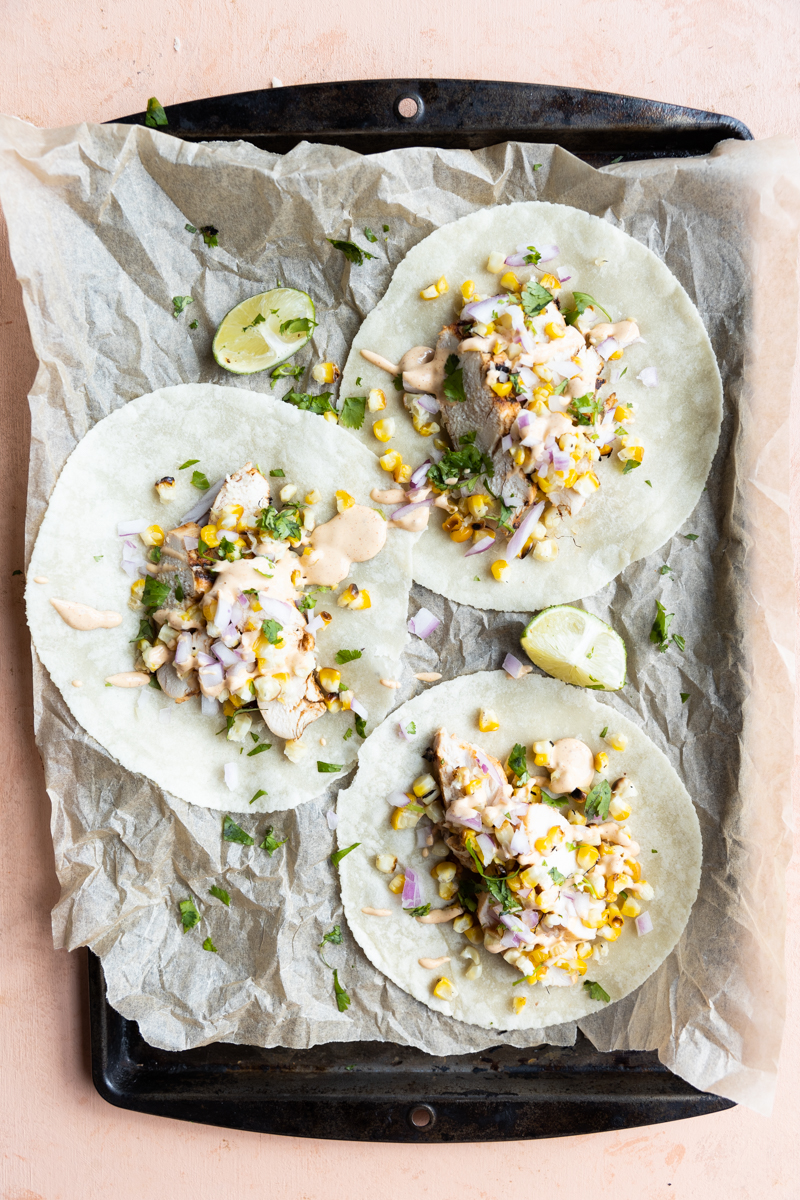 Tortillas with chicken breast grilled corn and all toppings.