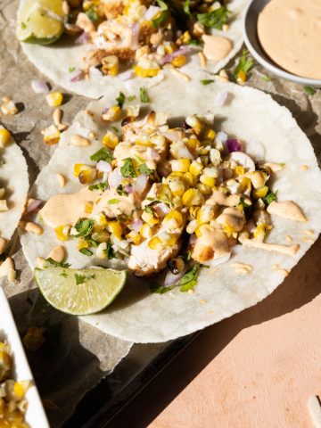 Close up picture of a spicy chicken taco.