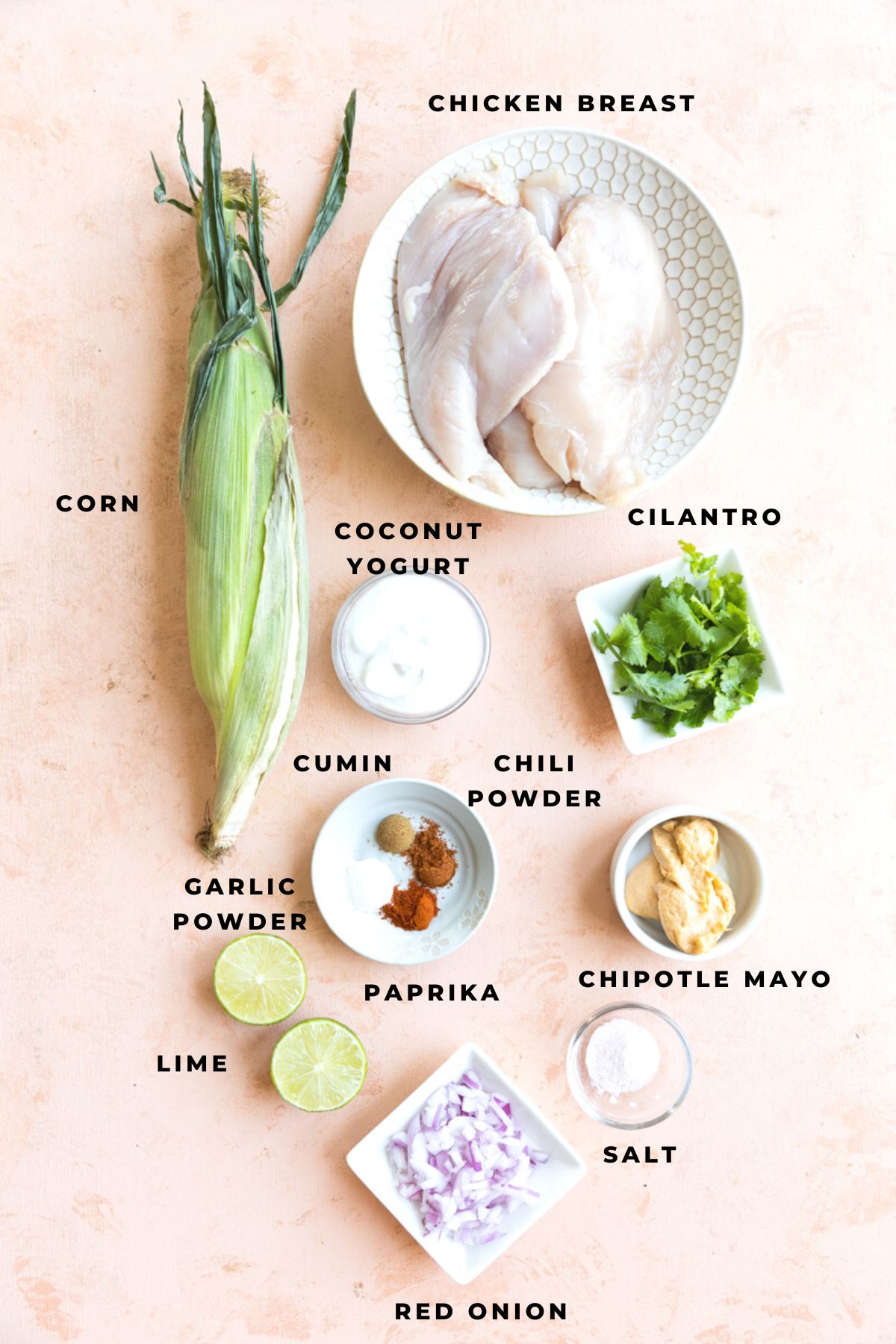 Ingredients for spicy chicken tacos measured out into small bowls.