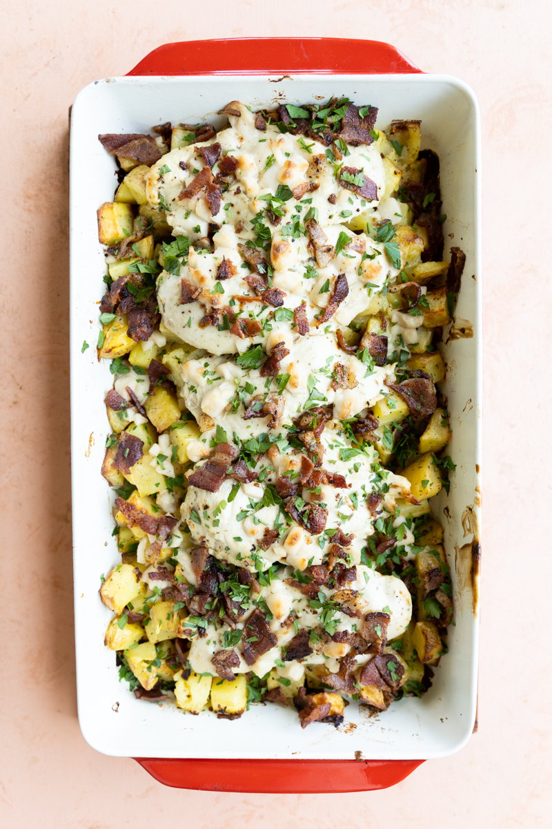 Chicken bacon ranch potato bake with fresh parsley on top.