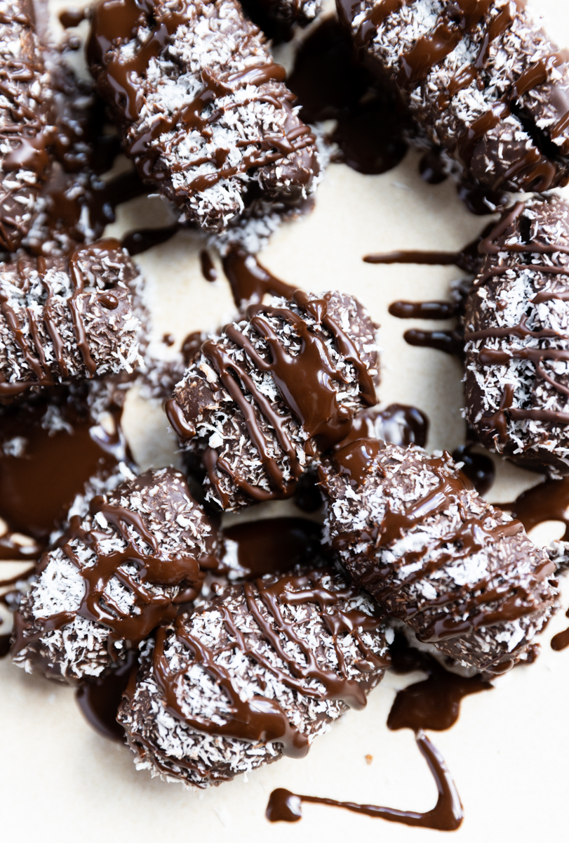 Chocolate covered dates with shredded coconut on top.