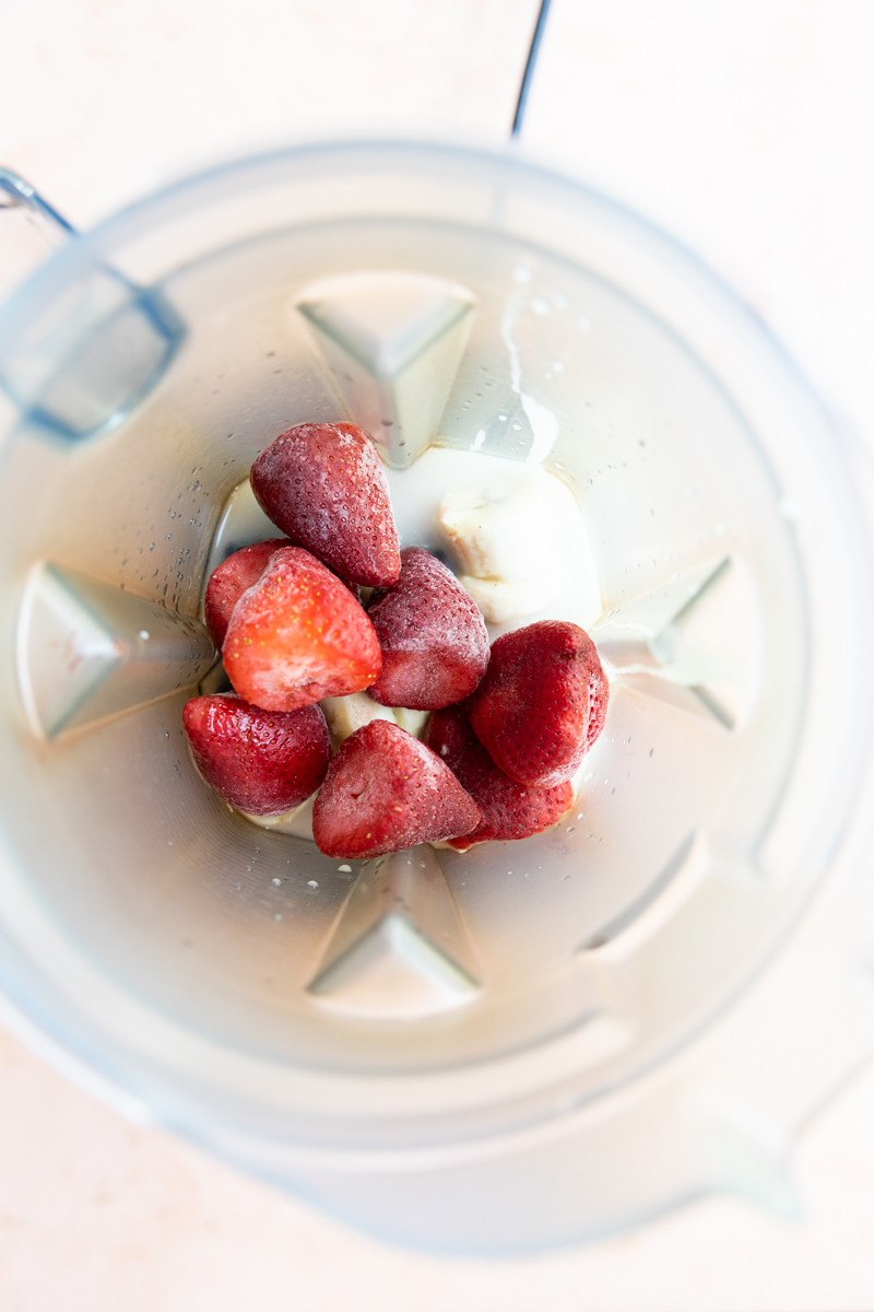 Blackberry smoothie ingredients in vitamix blender.