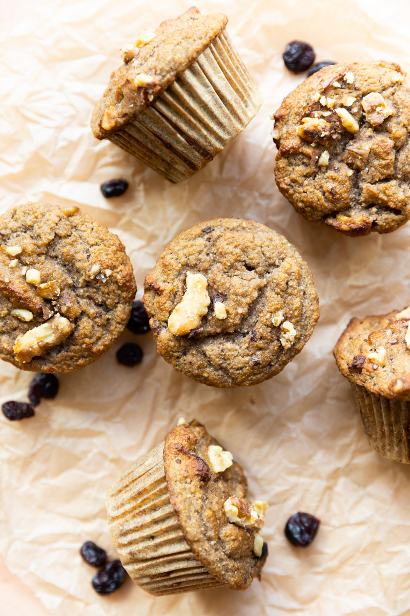 Cranberry Walnut Muffins on parchment paper.