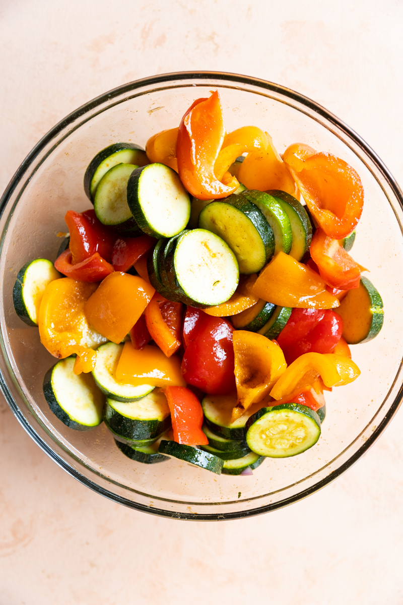 Vegetables mixed with spices and olive oil.
