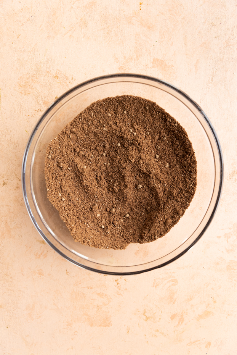 Dry ingredients in a glass mixing bowl.