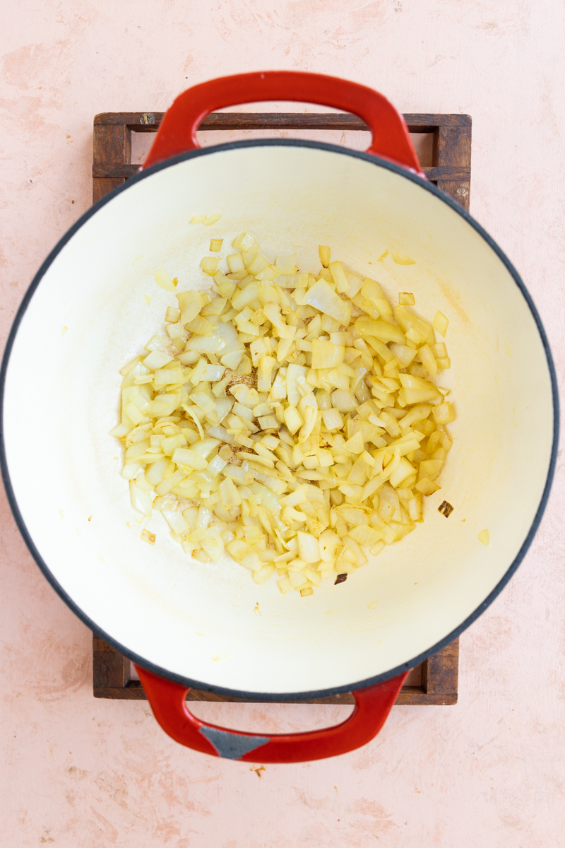Onions cooking in dutch oven.