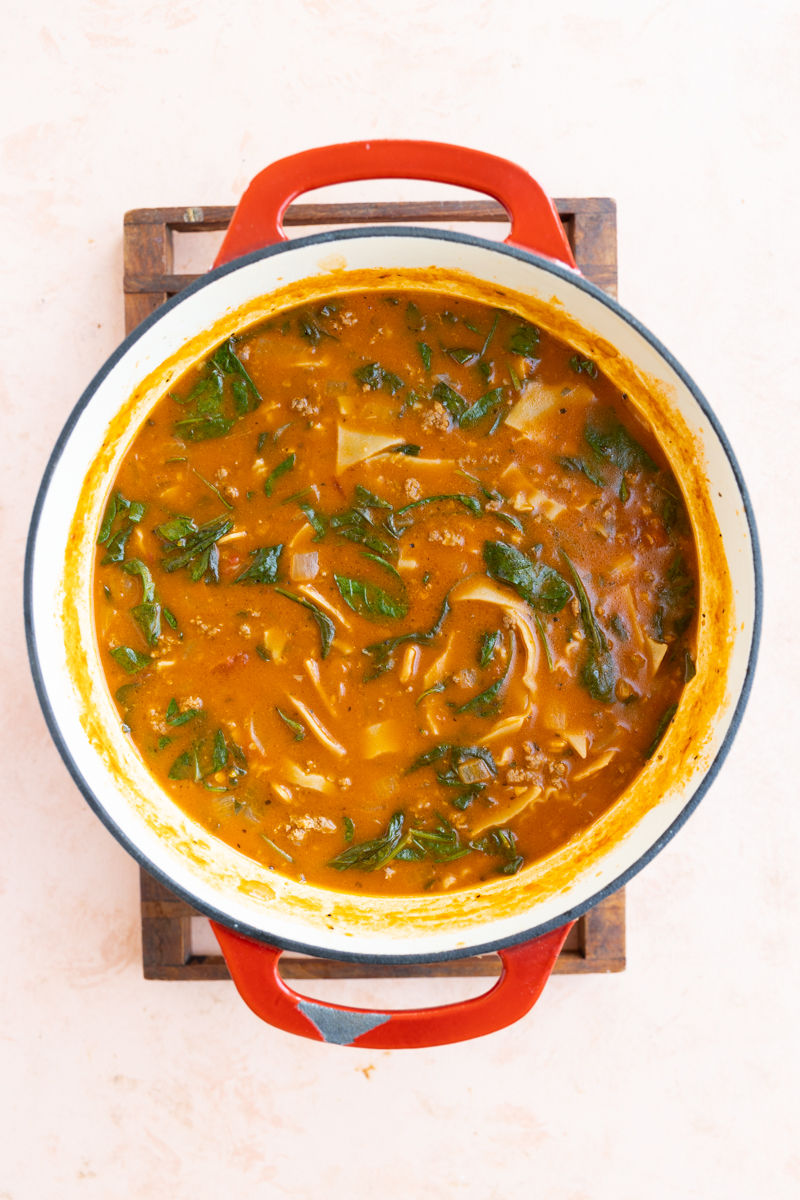 Fully cooked lasagna soup in dutch oven.