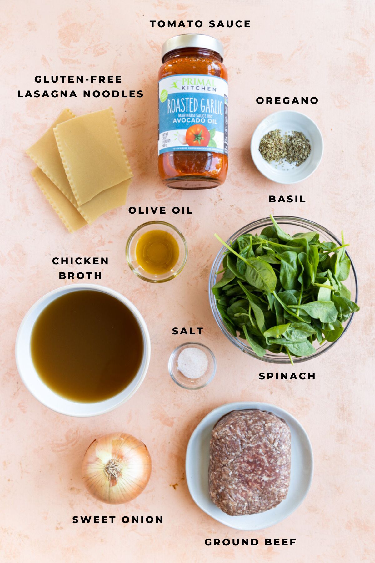 Lasagna soup ingredients measured out in small glass bowls.