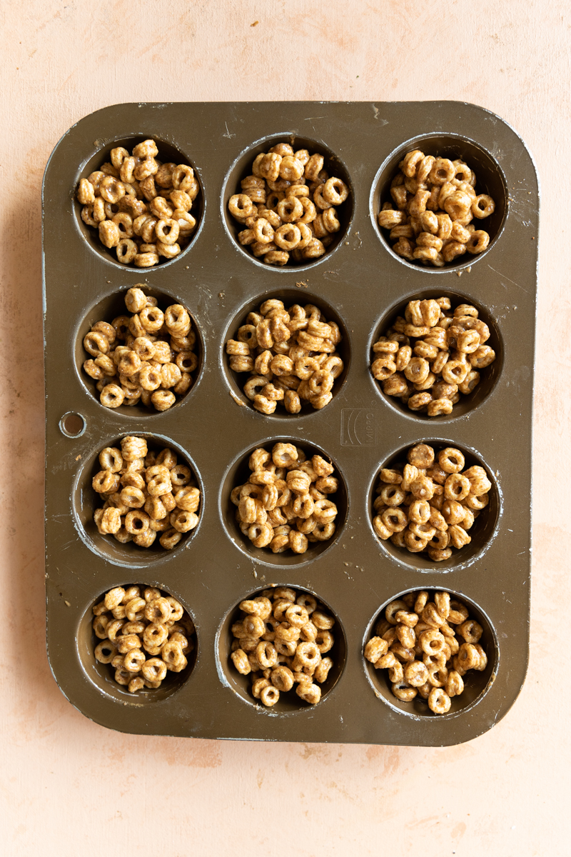 Cereal cookies pressed into a muffin tin.