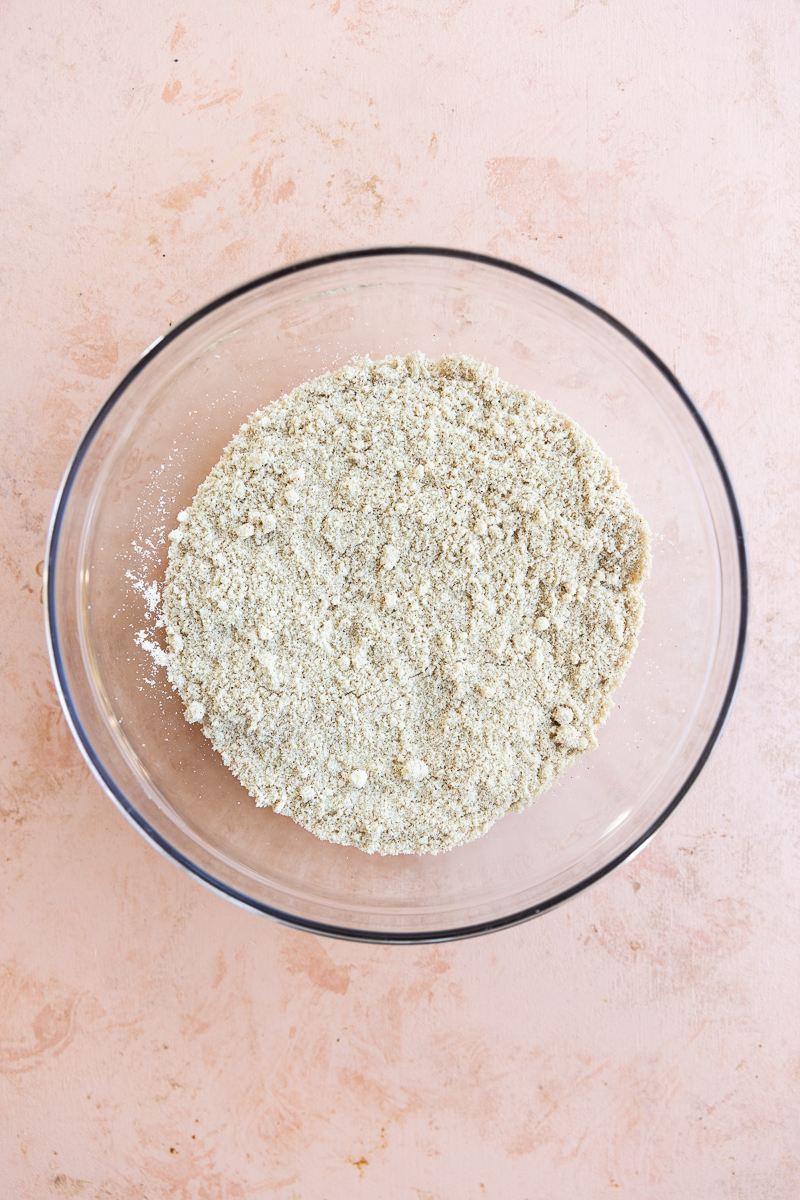 Dry ingredients in glass mixing bowl.