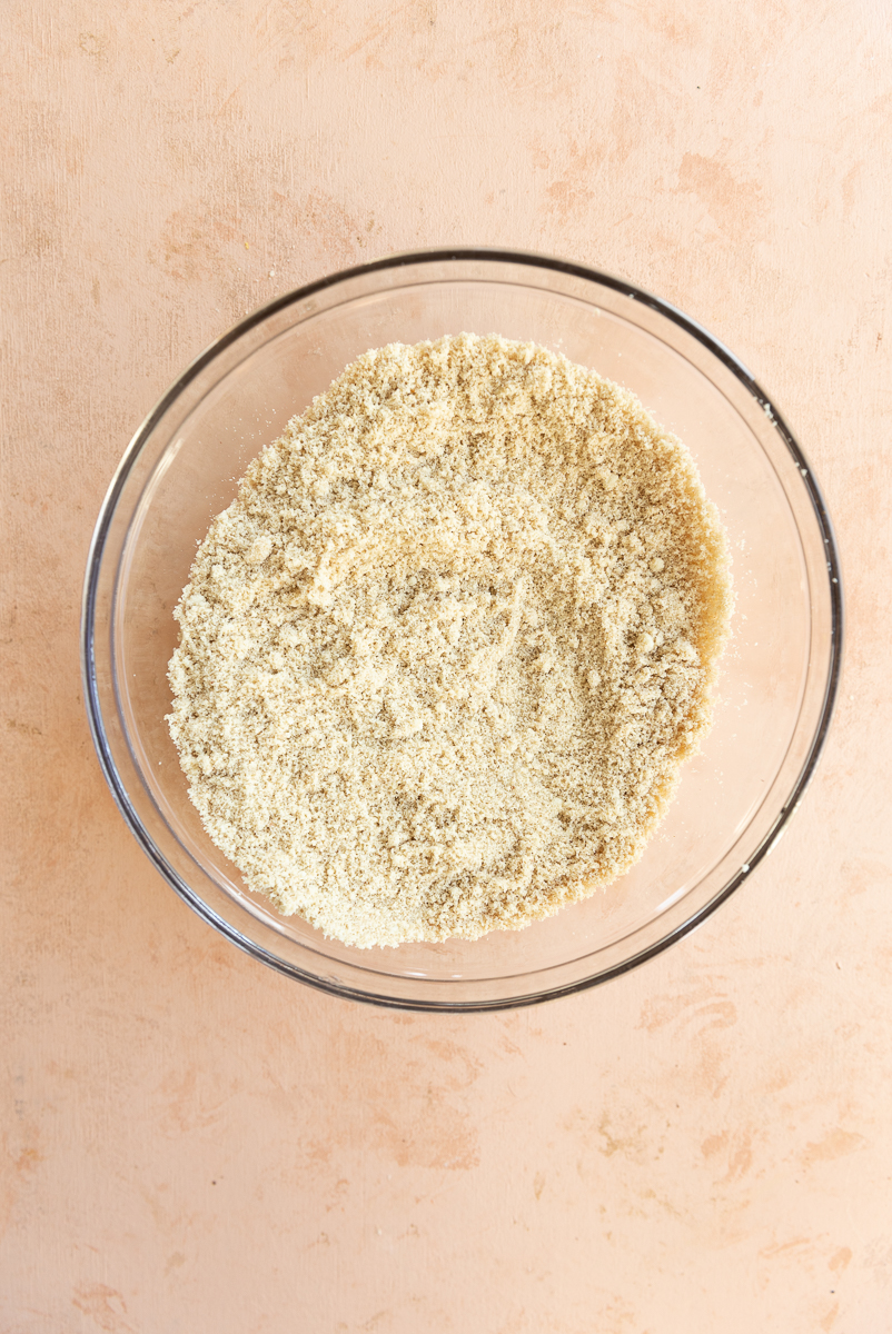 Dry ingredients in glass mixing bowl.