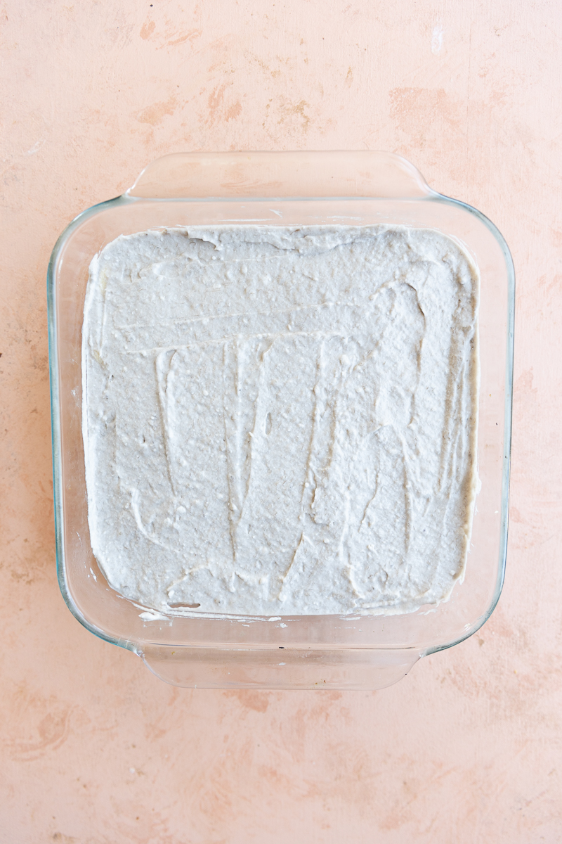 Whipped cream on top of crust and banana layer.