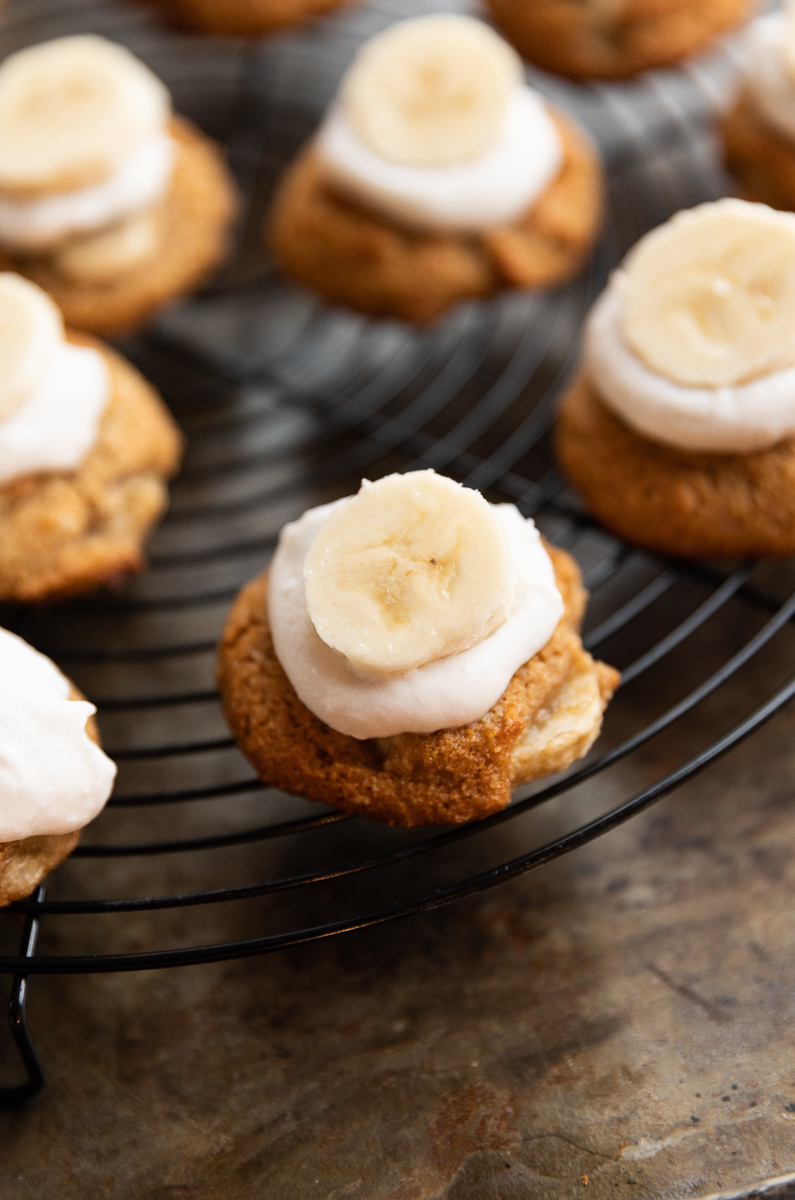 Banana cookies cooling on metal rack.