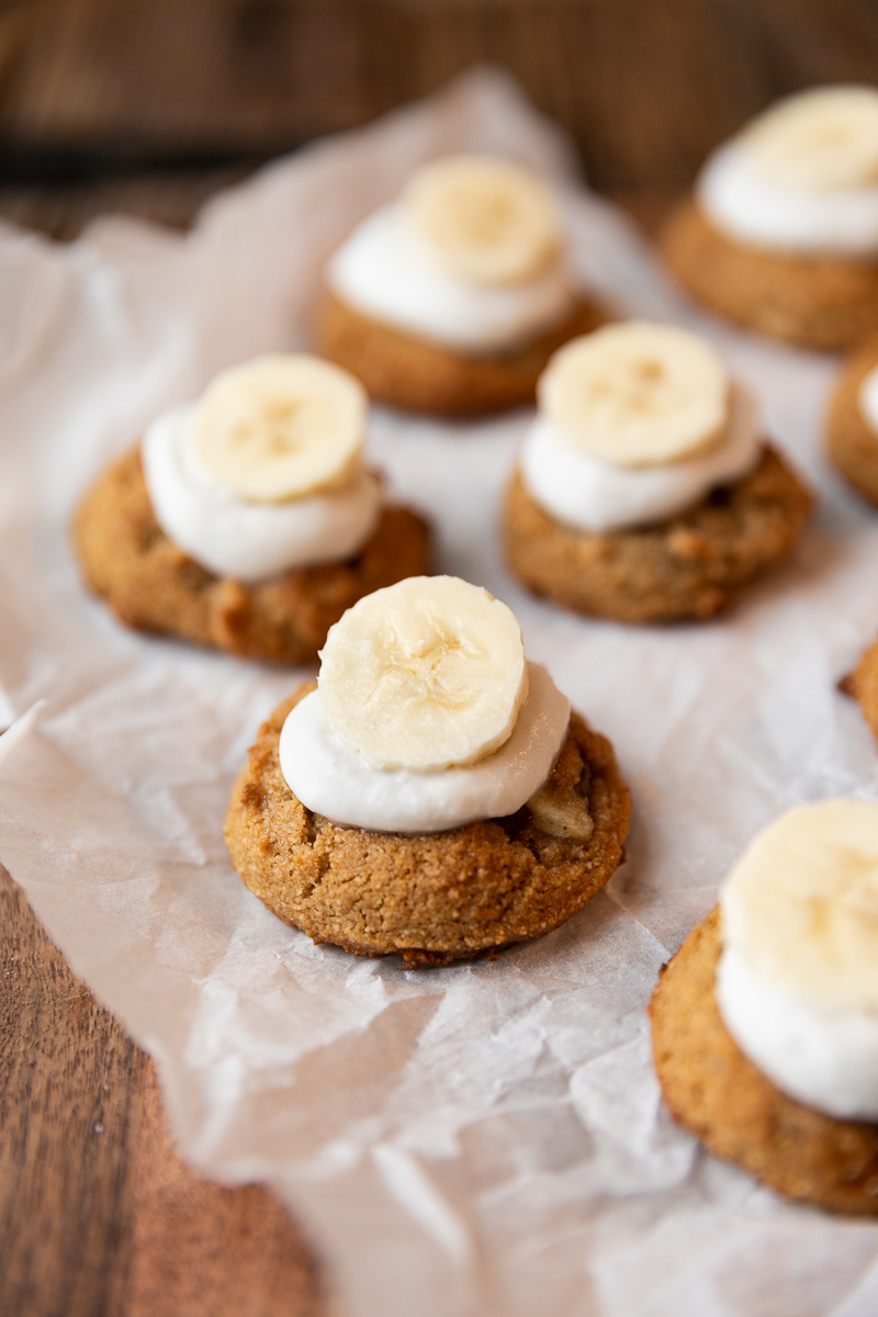 Banana cream pie cookies on parchment paper.