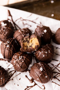 Cookie dough truffles with sea salt sprinkled on top.