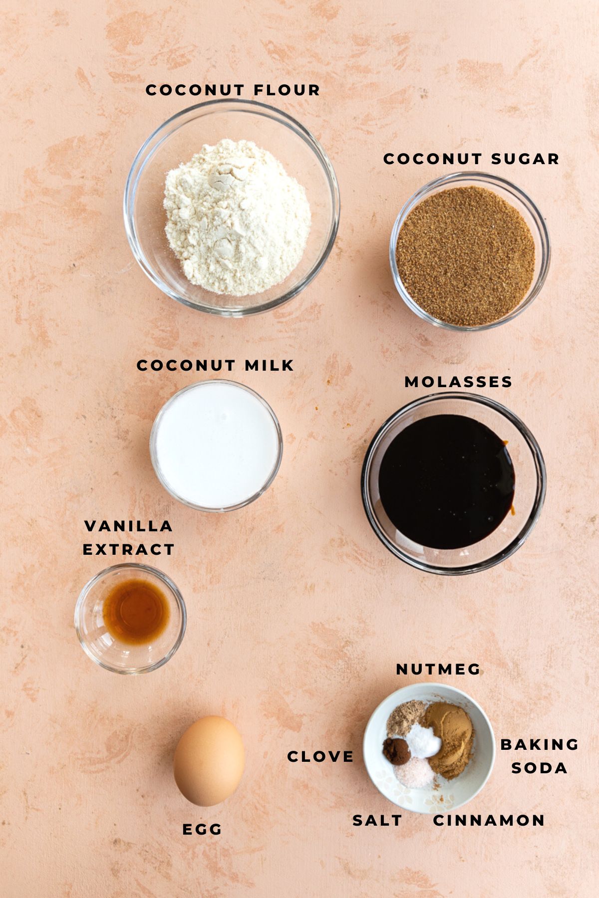 Gingerbread cookie bar ingredients measured out into small bowls.